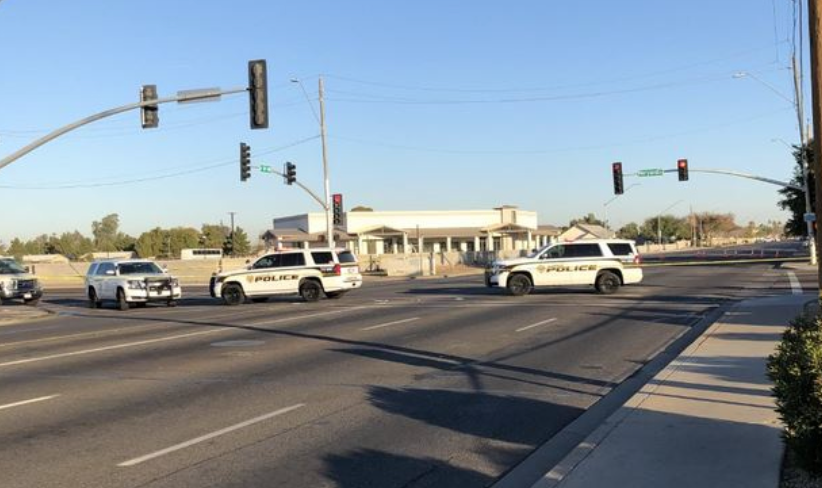 Police cars crossing